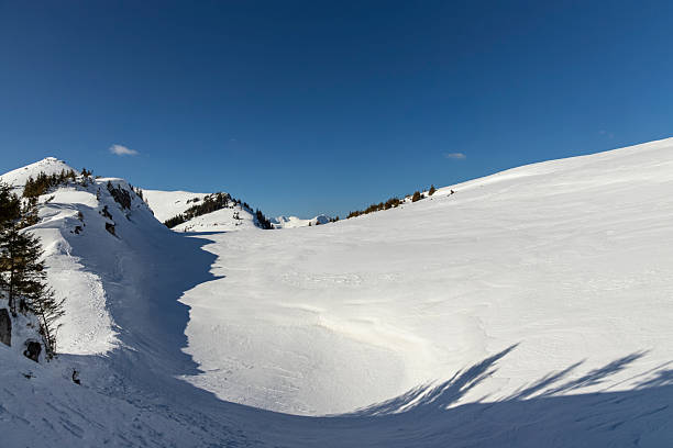 Snowy mountain panorama with fresh snow in winter without people