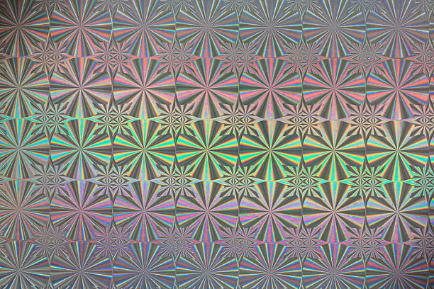 Holograph foil texture. Iridescent metal effect. Holographic glitter backdrop. Vibrant holographic texture with iridescent colors for modern design backgrounds or prints. Modern texture.
