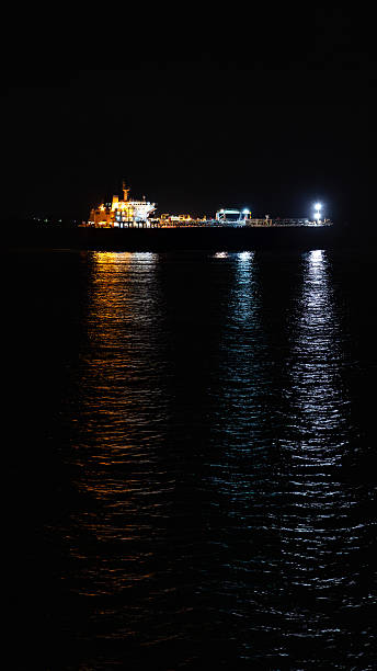 istock Bulk carrier ship sailing on open sea at night 2254520641