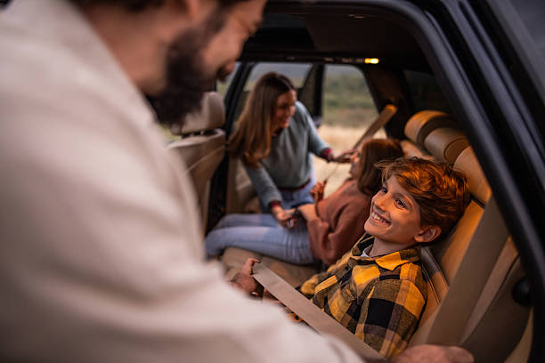 istock Family getting ready for road trip in car 2254521657