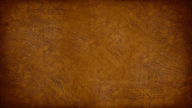 istock Black dark red brown burnt orange rough grunge texture background. Toned concrete wall surface. Close-up. Empty blank space design ad. 2254521980