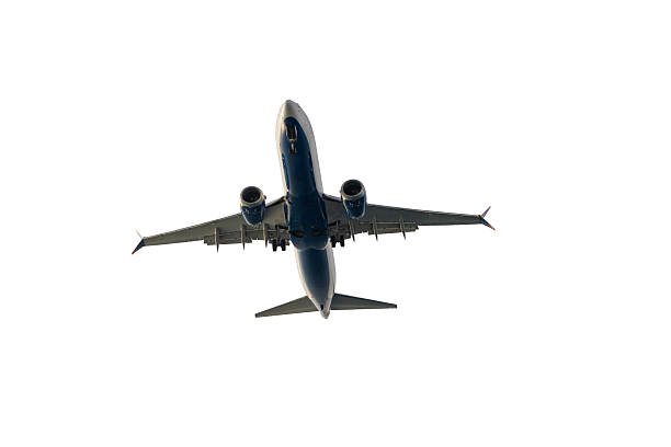 istock Passenger Airplane Flying Against Isolated Clear Sky 2254527999
