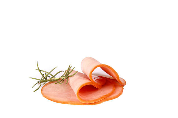 Top view of smoked pork salami chorizo sausages slices texture background. Raw smoked salami sausage surface