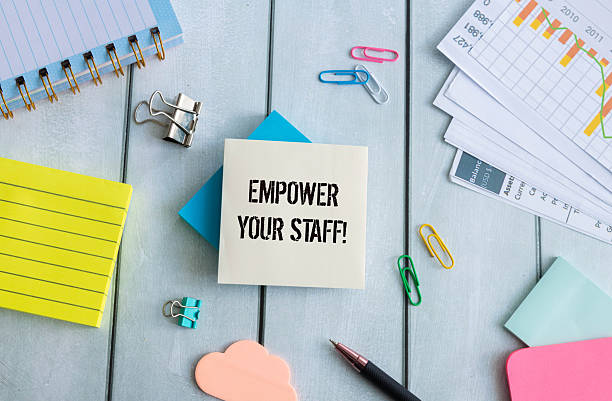 istock Wooden blocks with words 'Empower your staff'. 2254529399