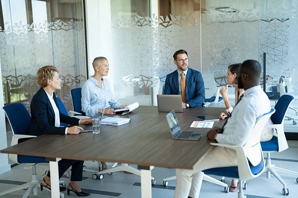 istock Business people having a meeting in a modern office 2254531845