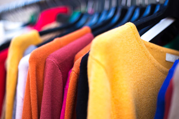 Red sweater isolated on white background, close up.