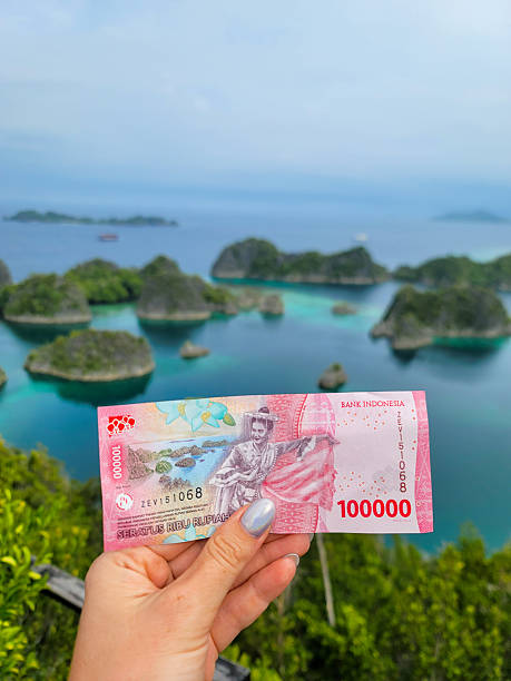 istock 100000 Indonesian rupiahs with islands of Pianemo viewpoint at Pianemo viewpoint 2254537849