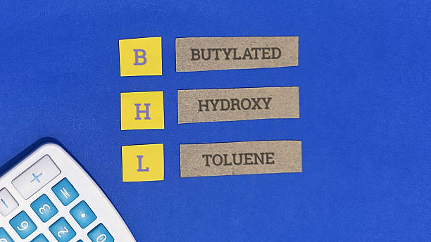 Butylated hydroxy toluene chemical formula on blue background with calculator