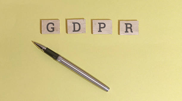 istock GDPR regulations concept with pen on yellow background 2254541562