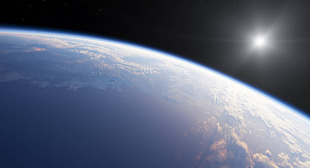 View of Earth from outer space showcasing a sunrise on the horizon in a 3D rendering.