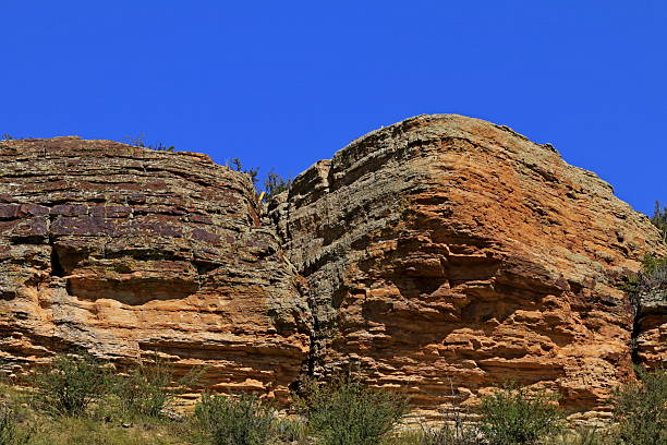 Cliffs in Colorado Owl Canyon Road (County Road 70) with blue sky closeup.