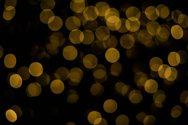 Beautiful abstract bokeh of soft twinkling lights in overlapping circles, suitable for graphic design and banners.