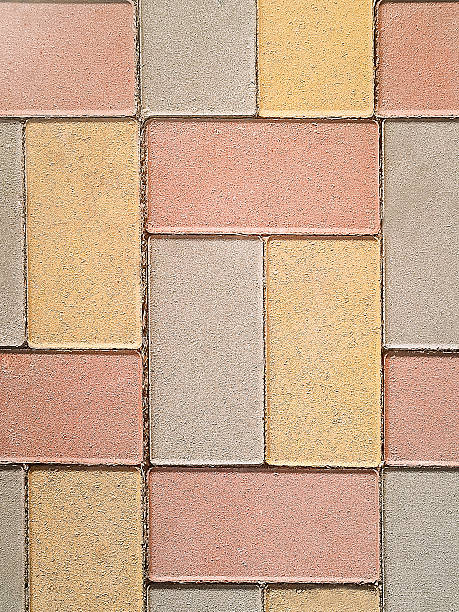 istock Multicolored paving slabs for paving sidewalks. Close-up, vertical photo. 2254560048