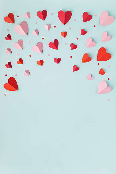 istock Valentine or Mother's Day frame blue vertical background with red hearts top view. Festive mockup or template for love design and promotion. 2254560583
