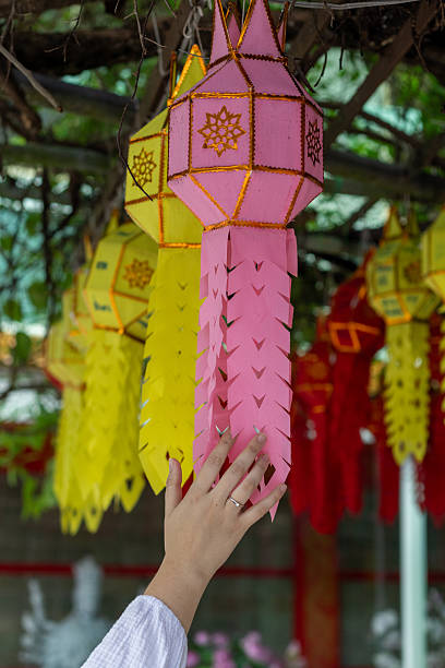 istock Hand Touching Traditional Lanna Thai Paper Lantern 2254561822