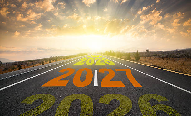 istock Years written on the asphalt from 2027 to 2030 2254563554