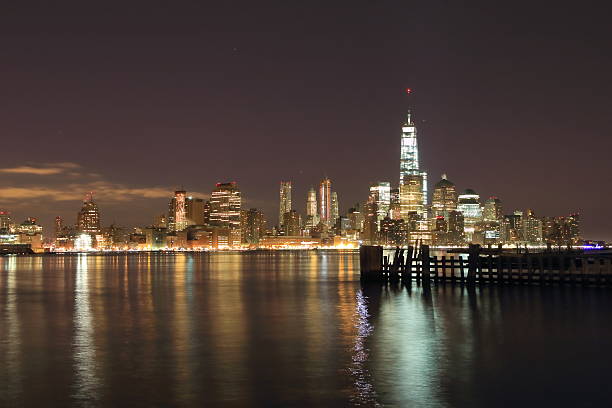 Lower Manhattan skyline at night. View from Jersey City.
