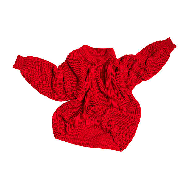 Red knitted sweater isolated on white background. Women's cotton wool sweater, cardigan, pullover, jacket. Clothing, cut out object for advertising, design. Mockup. Clothes levitation concept