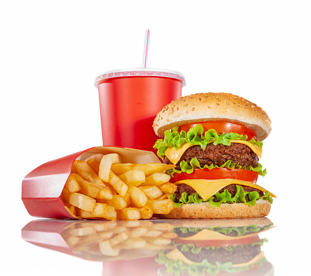 istock Appetizing cheeseburger with lettuce and tomato served with fren 2254578111