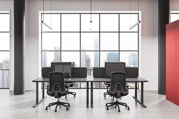 istock Modern open space office interior with ergonomic chairs and computers in front of large windows overlooking cityscape skyline. 3D Rendering. 3D Rendering 2254579528