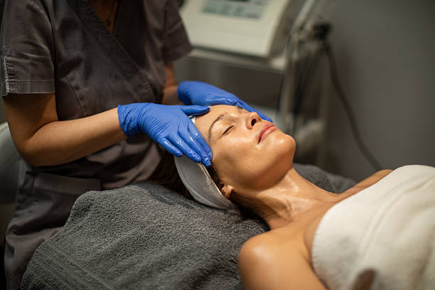 istock Face and neck relaxing massage at beauty spa 2254579737