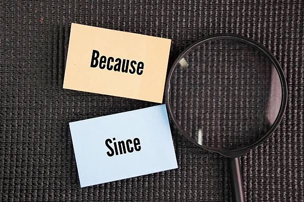 istock Magnifying glass and paper with the words because and since. 2254585141
