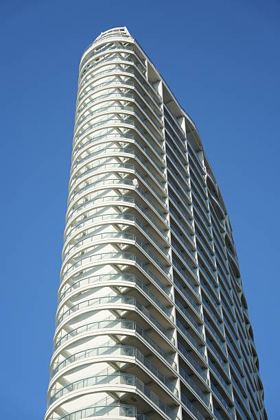Luxury high-rise seaside resort hotel with blue sky background