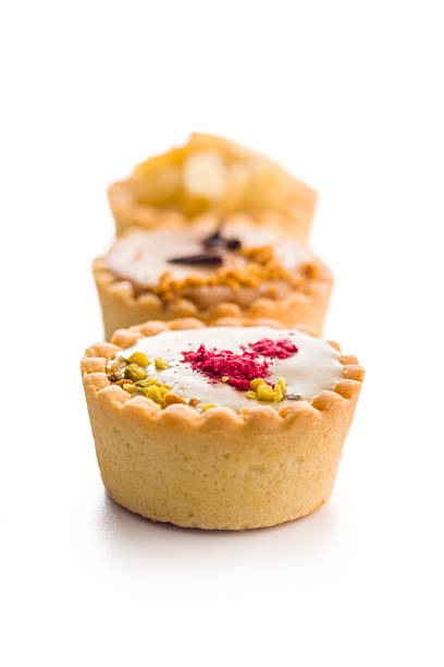 Sweet mini tartlets isolated on a white background.
