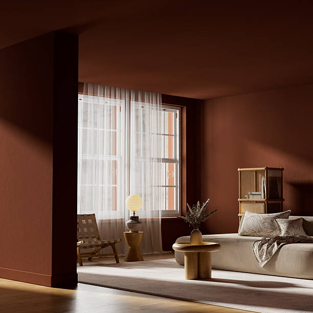istock Warm dark Scandinavian interior with terracotta wall, soft diffused lighting and minimalist negative space creating a calm atmospheric living area. 3D illustration. 2254587030