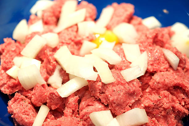 Meat loaf fixings ground beef, egg, onion, and tomato soup