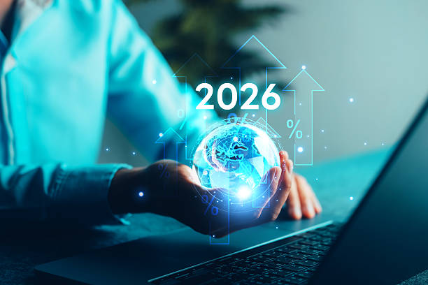 istock 2026. Businessman using laptop holding digital globe with upward arrows, representing global finance growth, future technology, investment strategy, economic trend, digital transformation concept. 2254591970