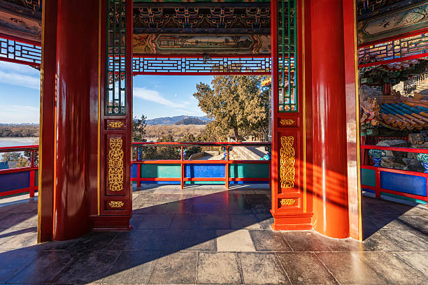 Close-up of a traditional Chinese red door adorned with intricate golden patterns, showcasing cultural and historical architectural details.Beijing, China