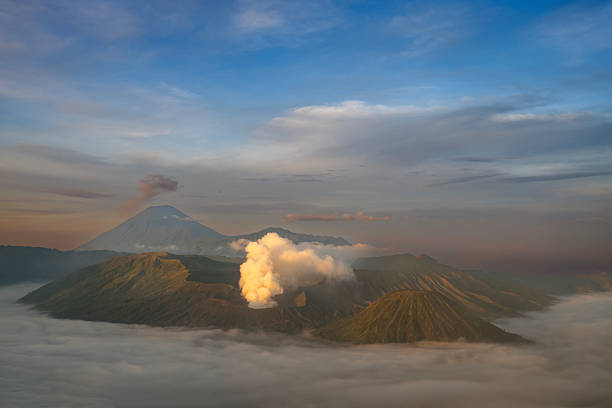 Mount Bromo at dawn amidst mist and smoke, East Java, Indonesia