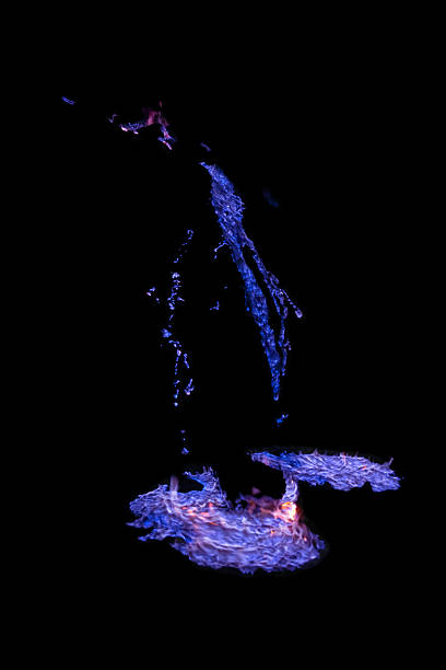 Blue lava at night at Ijen volcano, East Java, Indonesia