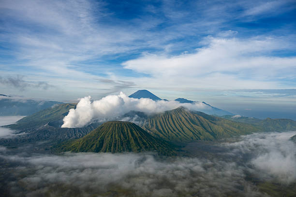 Mount Bromo at dawn amidst mist and smoke, East Java, Indonesia