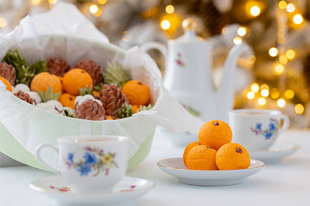 istock Zephyr arrangement featuring pine cones, cotton bolls, and oranges nestled in white tissue paper, creating a festive atmosphere with natural elements and seasonal charm 2254596282