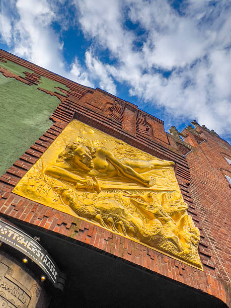 Germany, Bremen - September 12, 2024: Famous gold relief of Bremen. The heart of the city, Marktplatz, is known for the Town Hall (Rathaus), a UNESCO World Heritage site, and the famous Bremen Town Musicians statue.