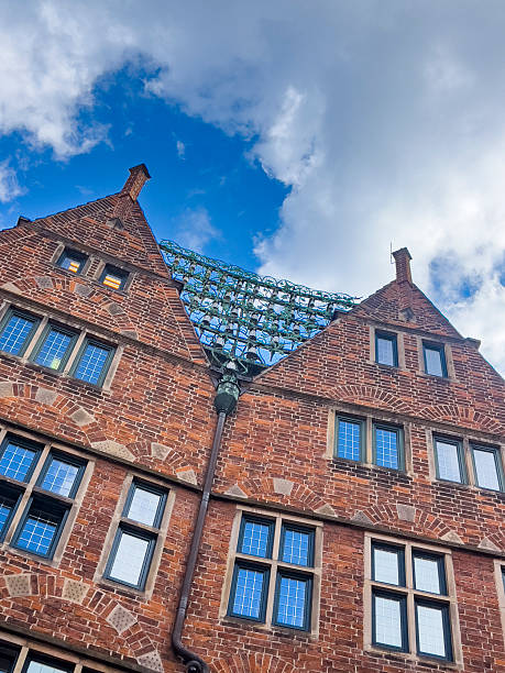 Germany, Bremen - September 12, 2024: Authentic buildings of Bremen. The heart of the city, Marktplatz, is known for the Town Hall (Rathaus), a UNESCO World Heritage site, and the famous Bremen Town Musicians statue.
