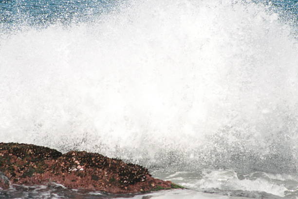 Waves breaking on the rocks