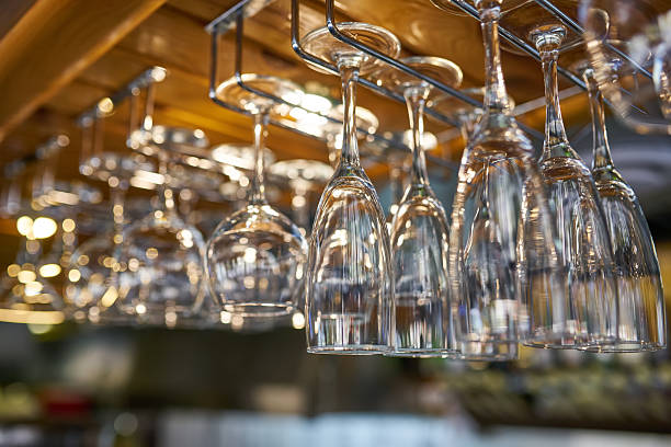 istock glasses for wine above a bar rack 2254599154