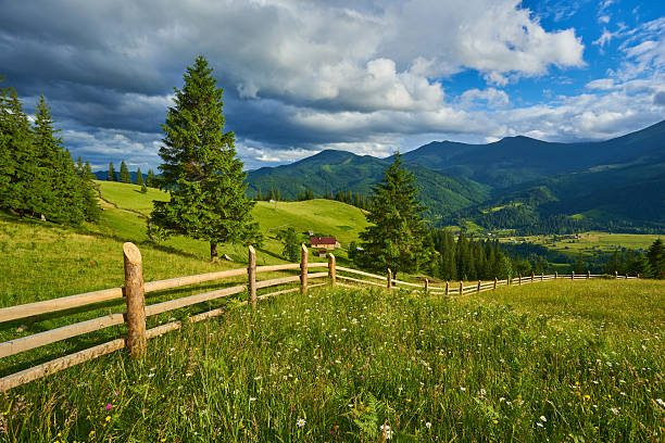 istock wooden fence in mountains 2254601087