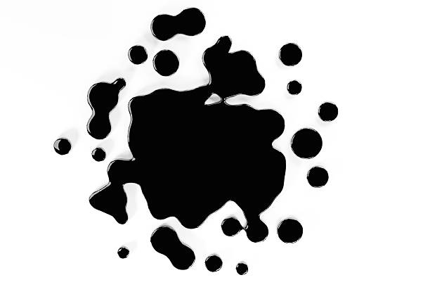 Glossy Black Oil Spill Abstract, Top View on White BackgroundAbstract glossy black oil spill with smooth reflective surfaces on a clean white background. Minimal modern composition representing petroleum, crude oil, environmental pollution, energy industry, contamination, and industrial fluid concepts.