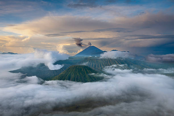 Mount Bromo at dawn amidst mist and smoke, East Java, Indonesia