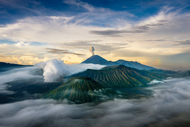 Mount Bromo at dawn amidst mist and smoke, East Java, Indonesia