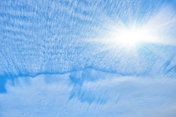White fluffy clouds in the blue sky