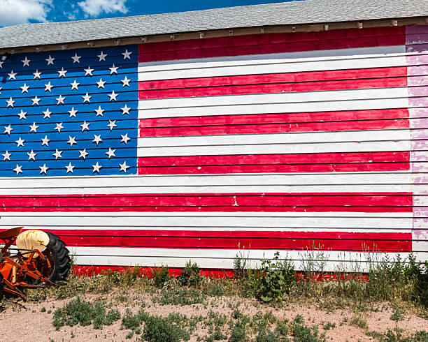American Flag Painted on a Barn With a  Farm Tractor, Seligman, Arizona, USA