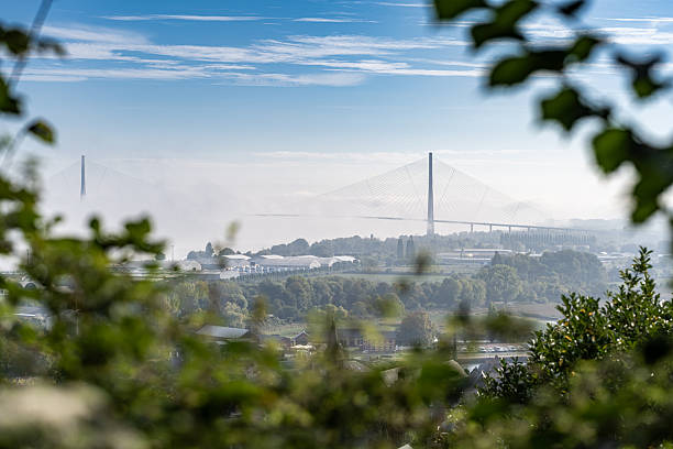The bridge of Normandy taken from an hill near Honfleur in Normandy, on a foggy yet sunny early automn day, with no people.