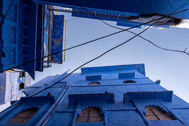 Very low angle view of various blue facade buildings in Jodhpur, India