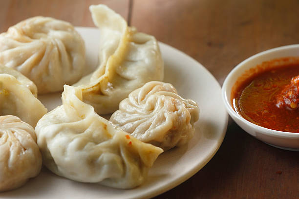istock Steamed Momos Assortment on White Plate 2254620088