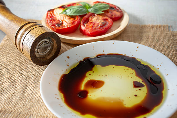 A view of a plate of Balsamic vinegar and olive oil.